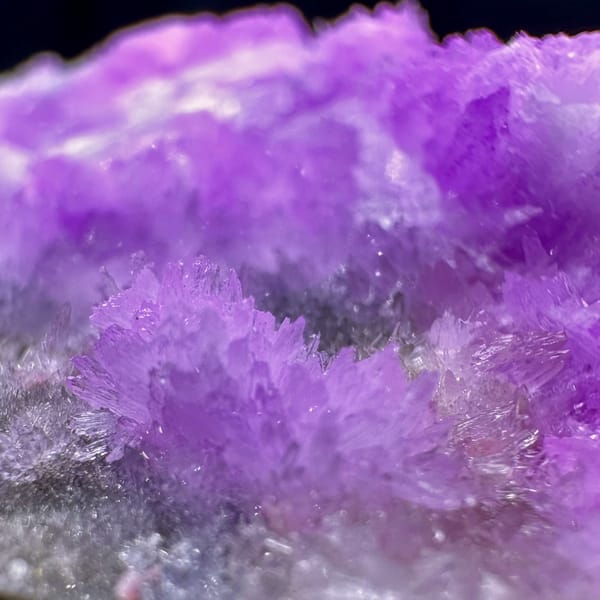 Vivid violet aragonite with clear gypsum blade from Yunnan, China, reverse side