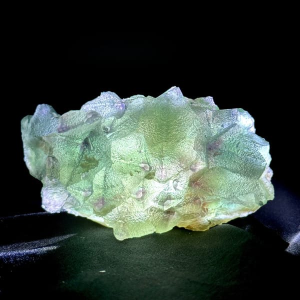 Translucent mint-green octahedral fluorite plate with purple edges from Zhejiang, China