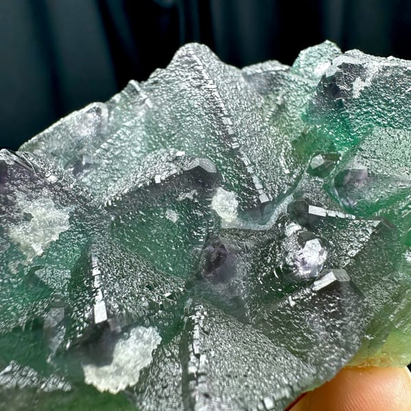 Translucent mint-green octahedral fluorite plate with purple edges from Zhejiang, China, top view
