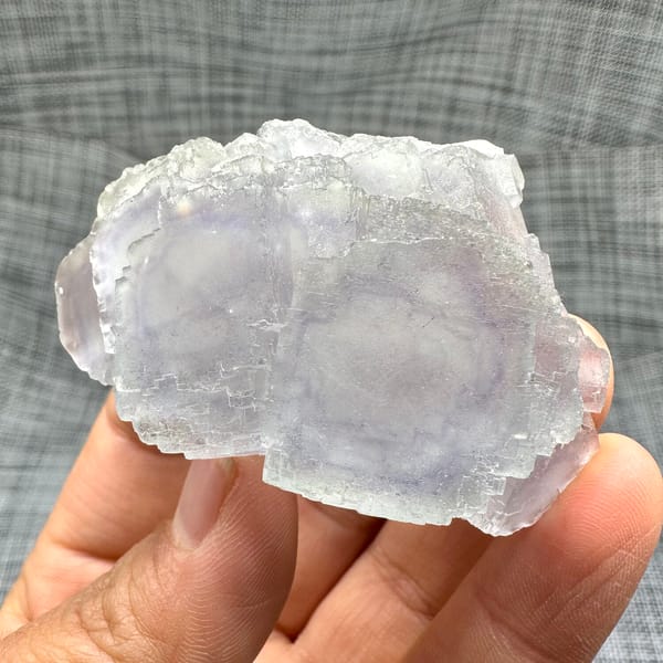 Large purple-framed fluorite crystal with frosted skin from Guangxi, China, close-up of terminations