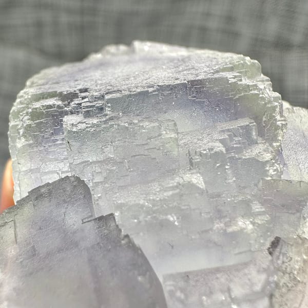 Large purple-framed fluorite crystal with frosted skin from Guangxi, China, overall view