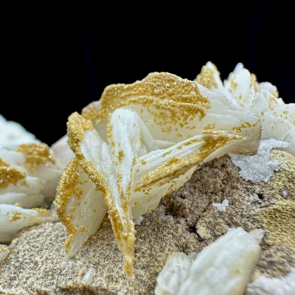 Tan baryte blades on white aragonite ridge from Morocco, reverse side