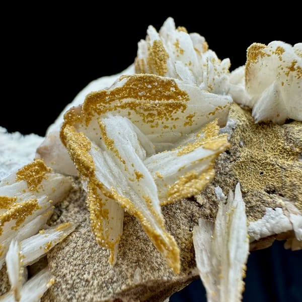 Tan baryte blades on white aragonite ridge from Morocco, top view