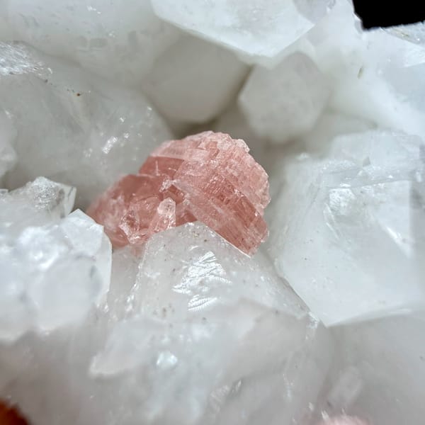 Pink rhodochrosite patch inside white quartz cluster from Guangxi, China, reverse side
