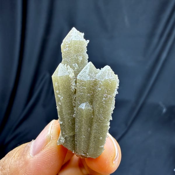 Grey-green quartz prisms with apophyllite from Inner Mongolia, China, close-up of the crystal faces