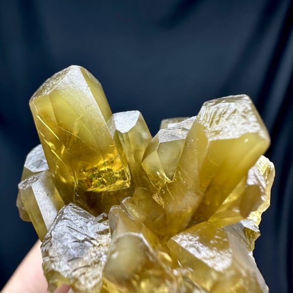 Golden-yellow baryte cluster with rabbit-ear blades from Chongqing, China, reverse side