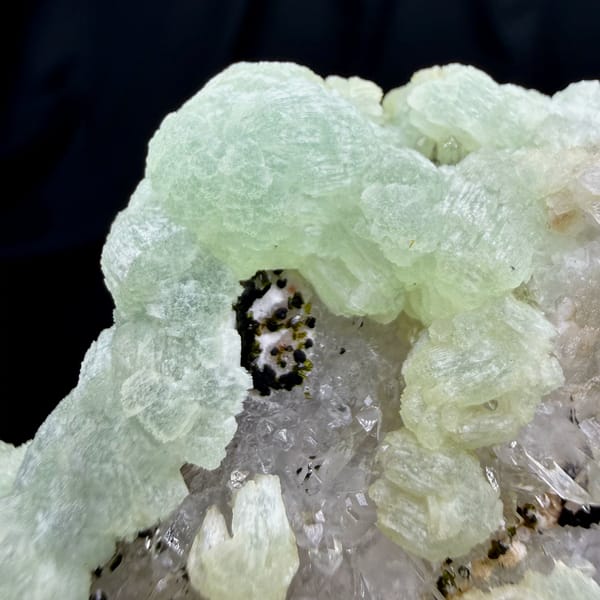 Mint-green prehnite balls with epidote and quartz from Sichuan, China, top view