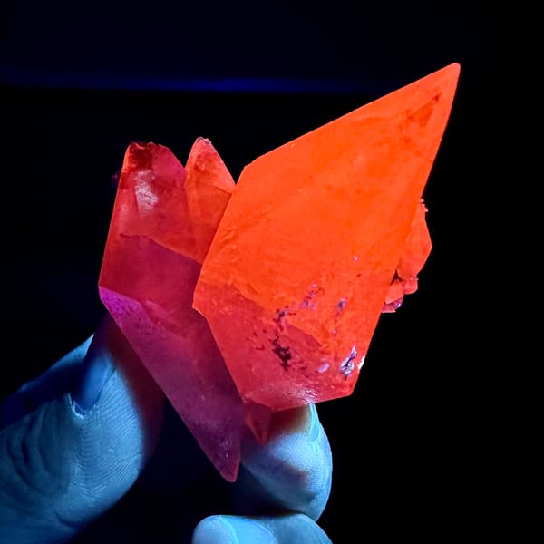 Tall translucent calcite scalenohedron from Inner Mongolia, China, detail of the matrix contact