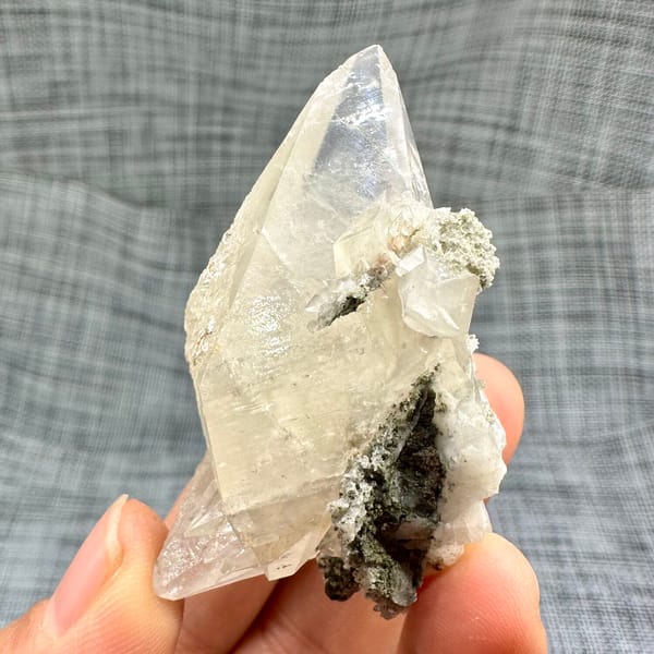 Tall translucent calcite scalenohedron from Inner Mongolia, China, overall view