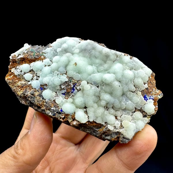 Pastel blue aragonite balls with malachite and azurite from Yunnan, China, second angle