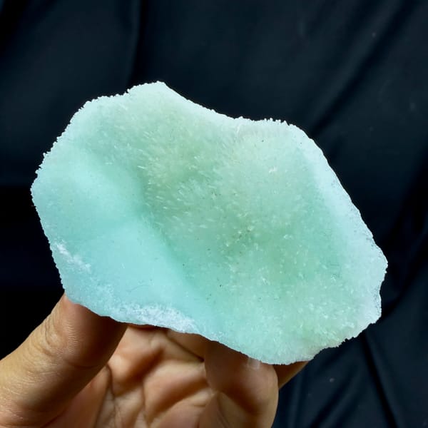 Flat aqua-green acicular aragonite plate from Yunnan, China, top view