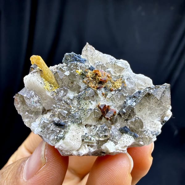 Quartz and feldspar plate with golden helvine crystal from Yunxiao, Fujian, China, close-up of the crystal faces
