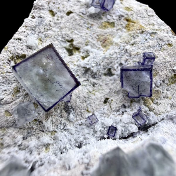 Purple-framed clear fluorite cubes on grey quartz from Inner Mongolia, China, second angle