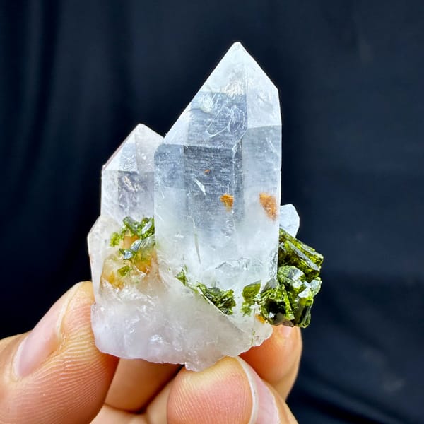 Two clear quartz points with epidote cluster from Sichuan, China, reverse side