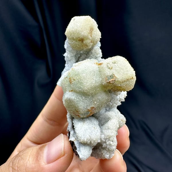 Hollow gumdrop fluorite balls with quartz from Inner Mongolia, China, second angle