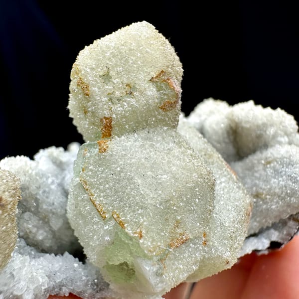 Hollow gumdrop fluorite balls with quartz from Inner Mongolia, China, reverse side