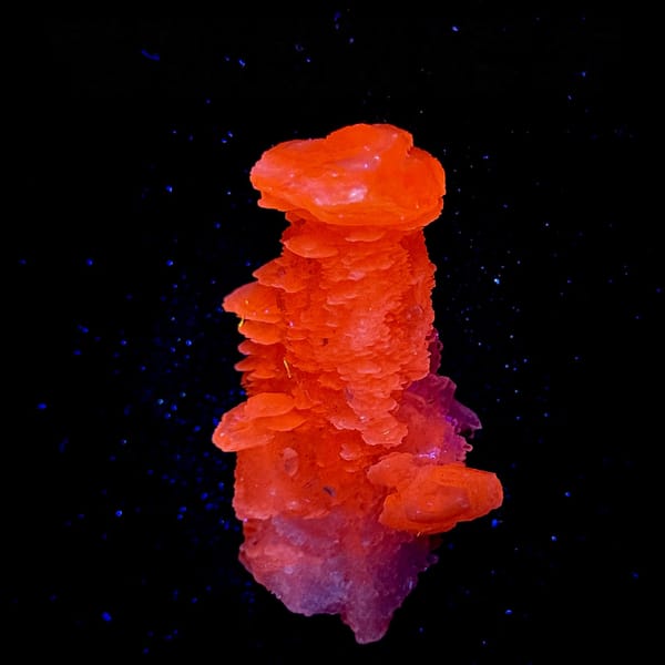 Layered calcite floater, from Fujian, China, detail of the matrix contact