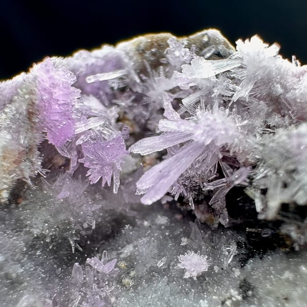 Magenta aragonite patch on pale grey matrix from Yunnan, China, reverse side