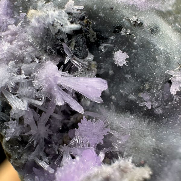 Magenta aragonite patch on pale grey matrix from Yunnan, China, top view