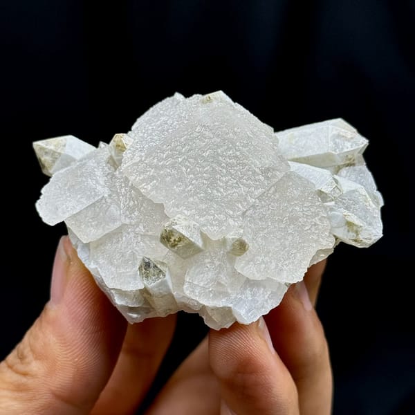 Star calcite with candle quartz, from Inner Mongolia, China, detail of the matrix contact