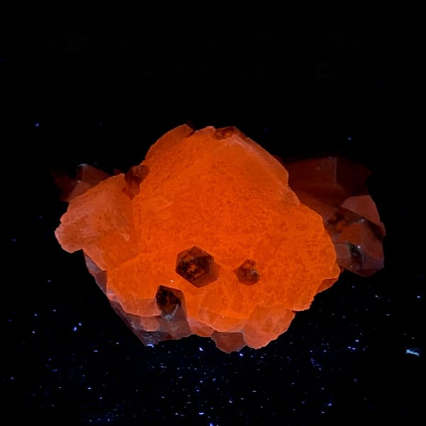 Star calcite with candle quartz, from Inner Mongolia, China, side view