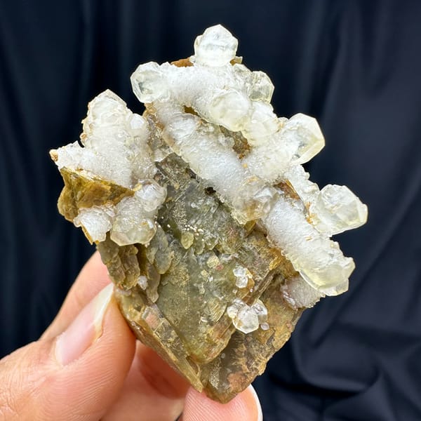 White calcite prisms on golden-brown siderite from Guizhou, China, second angle
