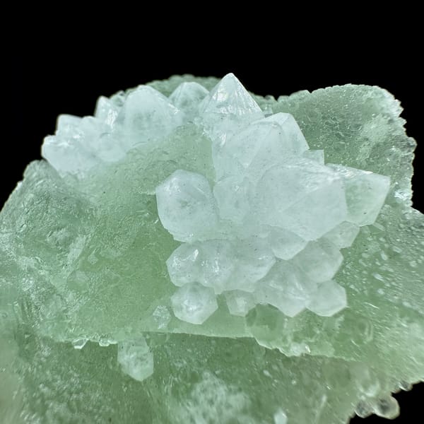 Mint-green fluorite mass with white quartz patch from Guangdong, China, top view