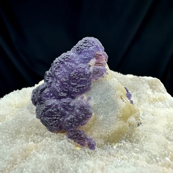 Purple fluorite half-wrapped in white quartz from Inner Mongolia, China, second angle
