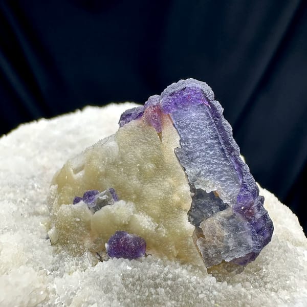 Purple fluorite half-wrapped in white quartz from Inner Mongolia, China, reverse side