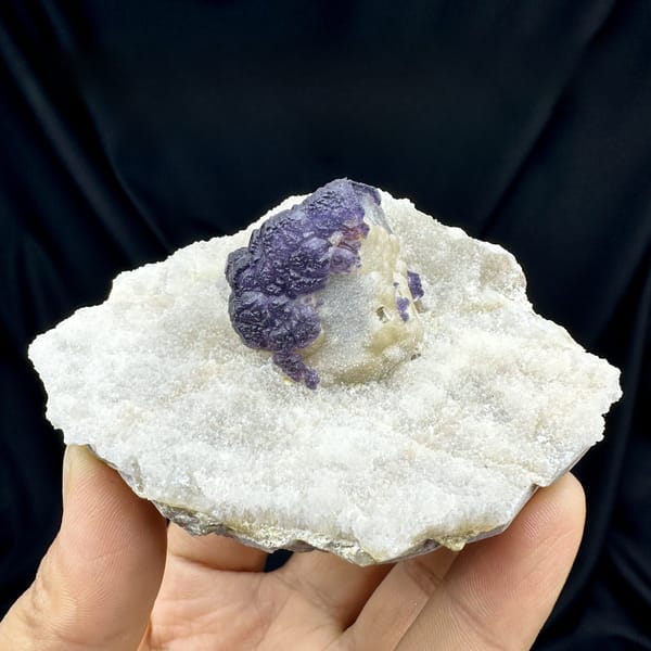 Purple fluorite half-wrapped in white quartz from Inner Mongolia, China, top view