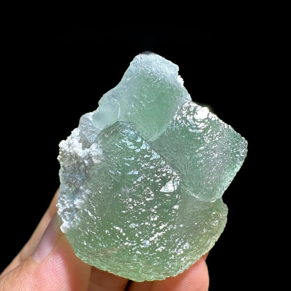 Pale green stepped fluorite crystal with sugary skin from Xianghualing, Hunan, China