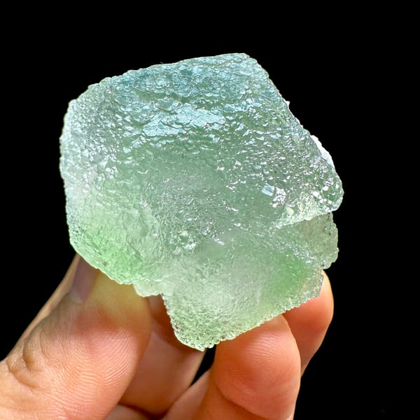 Pale green stepped fluorite crystal with sugary skin from Xianghualing, Hunan, China, second angle
