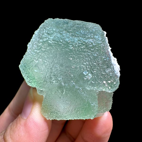 Pale green stepped fluorite crystal with sugary skin from Xianghualing, Hunan, China, reverse side