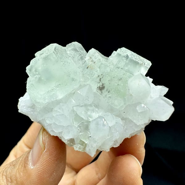 Pale green fluorite cubes with inclusions on white quartz from Guangdong, China, second angle