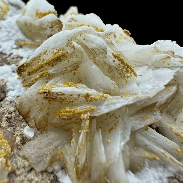 Tan baryte blades on white aragonite with vanadinite from Morocco, second angle
