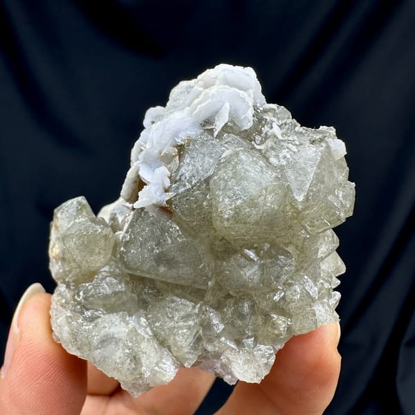 Double-terminated green quartz with calcite plates from Inner Mongolia, China, reverse side