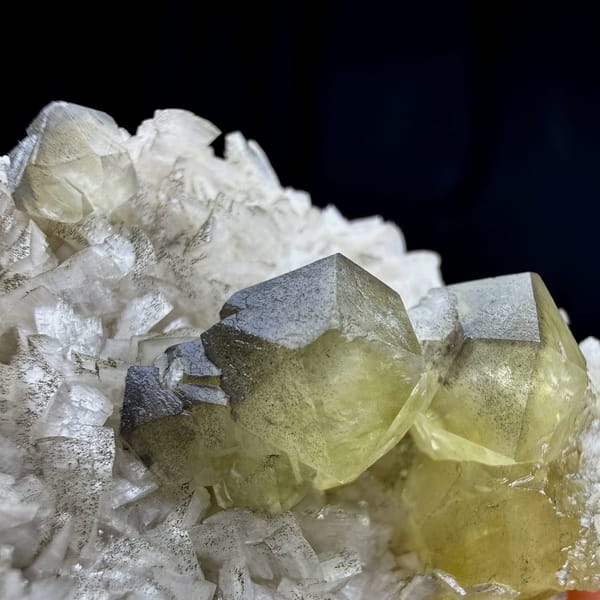 Pale yellow calcite crystal on cream dolomite rhombs from Guizhou, China, reverse side