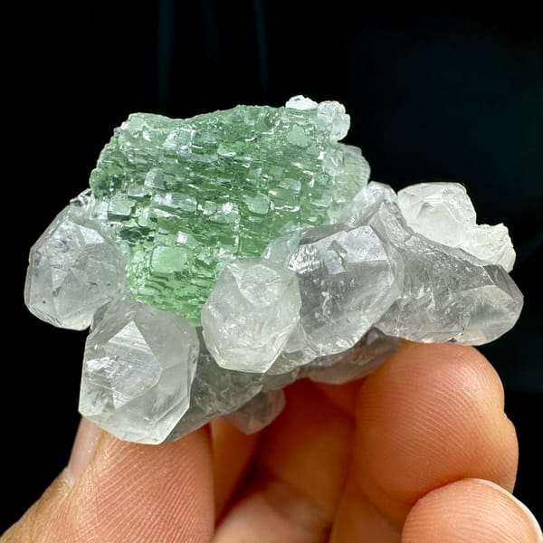 Stepped green fluorite with calcite, from Fujian, China, close-up of the crystal faces