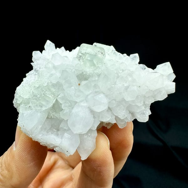 Pale green fluorite cube nested in white quartz points from Guangdong, China, second angle