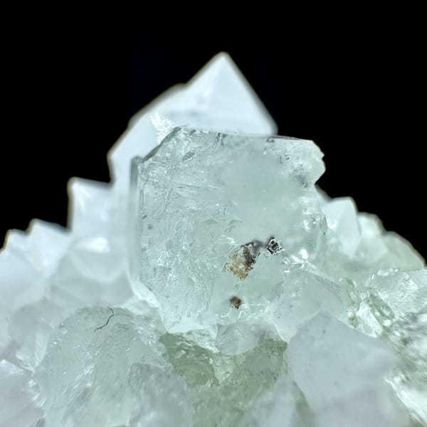 Pale green fluorite cubes in white quartz from Guangdong, China, top view
