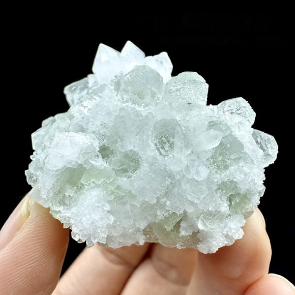 Pale green fluorite cubes in white quartz from Guangdong, China, detail of the matrix contact