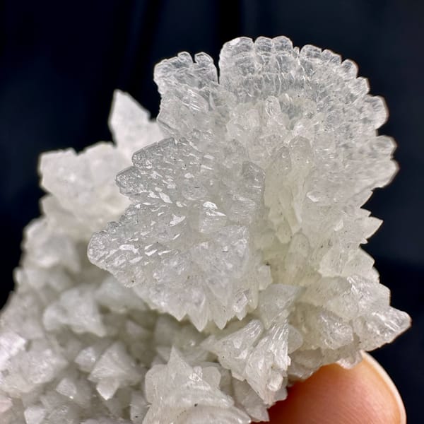 White calcite cluster from Guizhou, China, close-up of the crystal faces