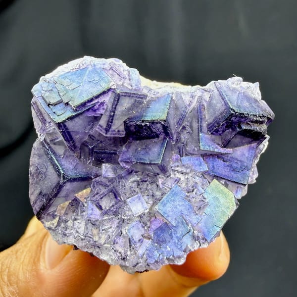 Iridescent purple-framed fluorite cubes with rainbow film from Inner Mongolia, China