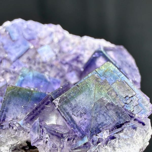 Iridescent purple-framed fluorite cubes with rainbow film from Inner Mongolia, China, second angle