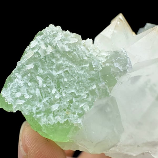 White quartz cluster flanked by mint-green fluorite cubes from Fujian, China, close-up of the crystal faces