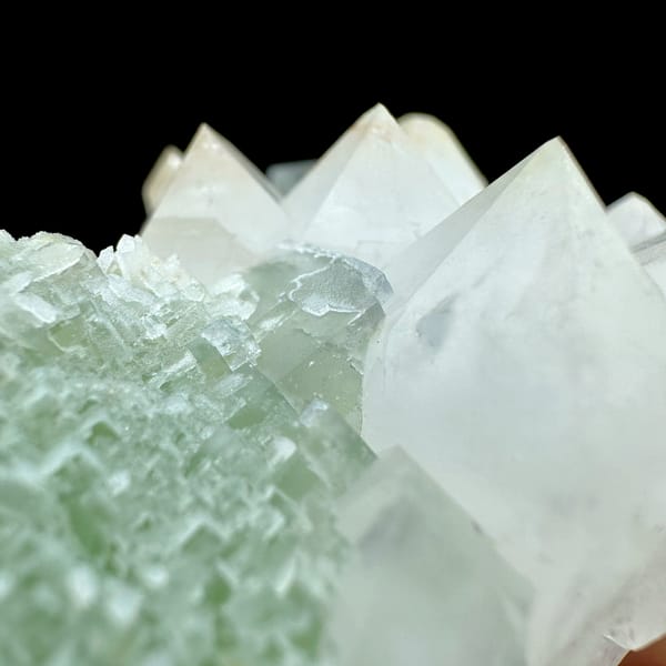 White quartz cluster flanked by mint-green fluorite cubes from Fujian, China, top view
