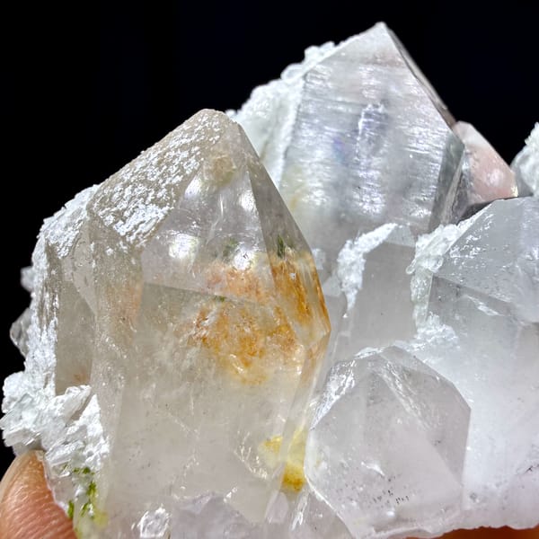 Clear garden-quartz cluster with orange inclusion from Sichuan, China, reverse side