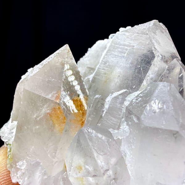 Clear garden-quartz cluster with orange inclusion from Sichuan, China, top view