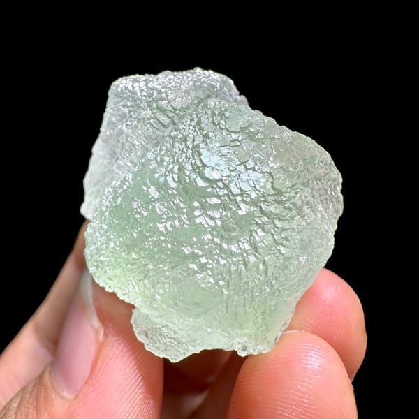 Mint-green stepped fluorite crystal from Xianghualing, Hunan, China, close-up of the crystal faces