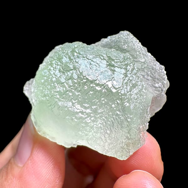 Mint-green stepped fluorite crystal from Xianghualing, Hunan, China, reverse side
